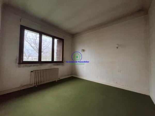 Maison de type 4 avec garage en sous sol