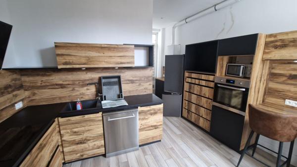Appartement dans un immeuble de style Haussmannien boulevard Lafayette Calais 3 pièces100 m2 au 1er étage côté cour