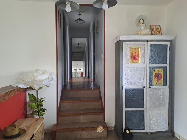 Maison de charme avec jardin, à pied des commerces, avec un espace pro.