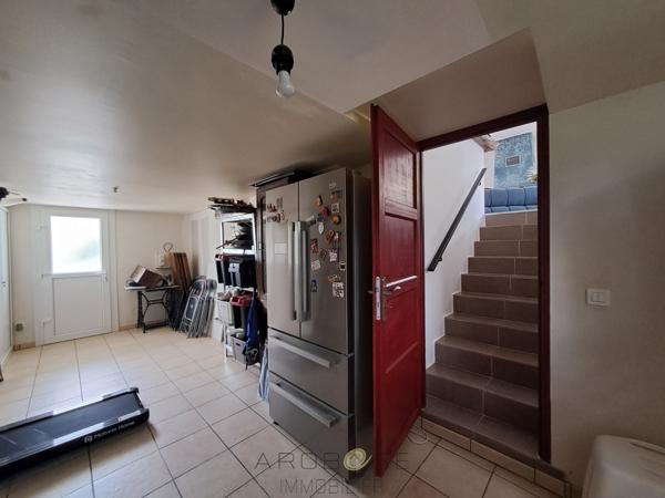 Maison de charme avec jardin, à pied des commerces, avec un espace pro.