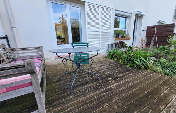 Jolie maison 2 faces avec garage et jardin