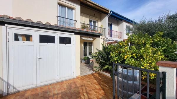 Jolie maison 2 faces avec garage et jardin