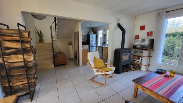 Jolie maison 2 faces avec garage et jardin