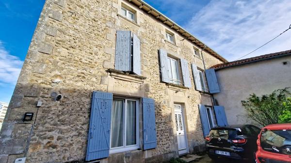 Opportunité investisseur : immeuble sans vacance locative avec 4 logements et stationnement privé