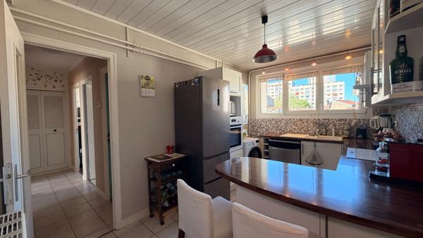 Appartement 3 pièces 74 M² avec balcon, cave et garage