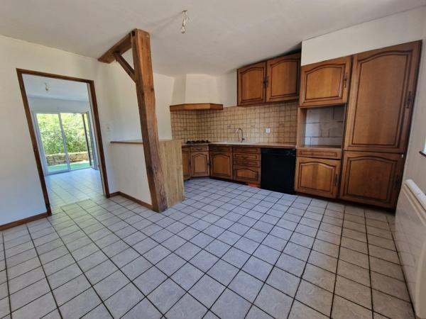 Appartement à vendre 3 pièces en rez-de-jardin proche de EPINAL (88) avec TERRASSE et TERRAIN
