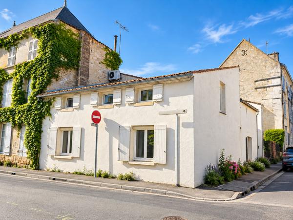 IMMEUBLE MIXTE AVEC POTENTIEL LOCATIF EN CŒUR DE VILLE