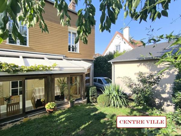 Maison centre ville avec garage et jardin
