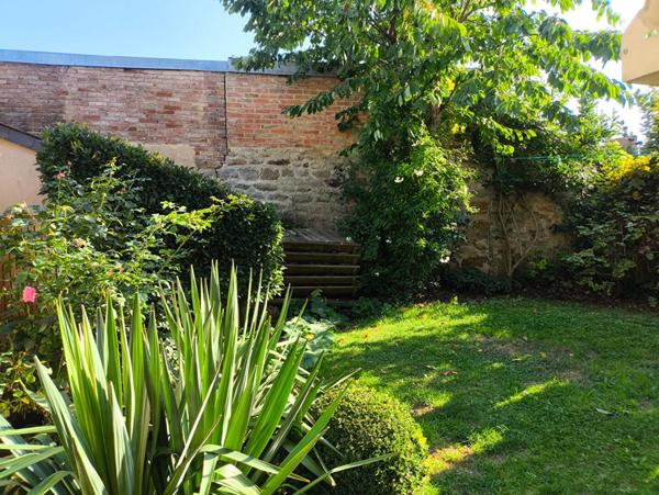 Maison centre ville avec garage et jardin