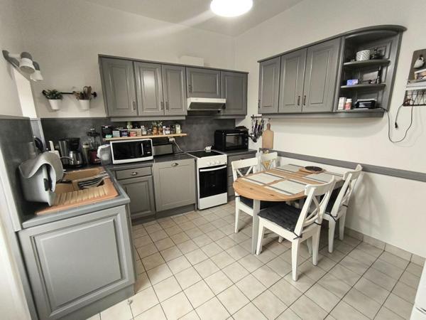 Maison centre ville avec garage et jardin