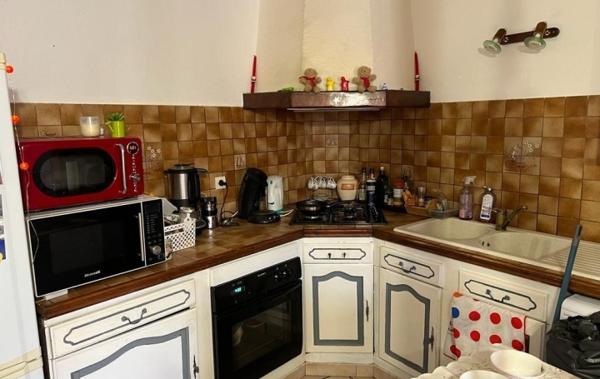 Vente Immeuble local commercial + appartement Meze   