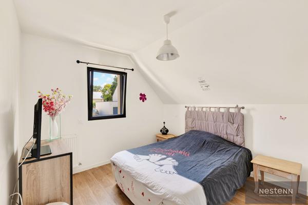 À vendre maison contemporaine vivable de plain pied dans le bourg d'HILLION