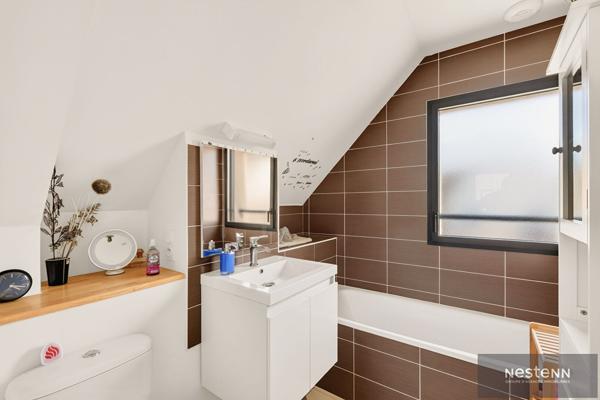 À vendre maison contemporaine vivable de plain pied dans le bourg d'HILLION