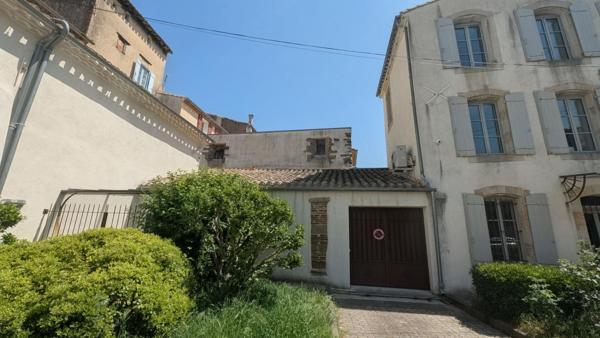 Centre ville maison T 4 avec garage et dépendance