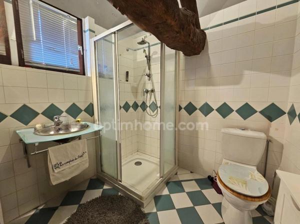 Maison charentaise de 232 m², 6 chambres, un bureau, piscine et un garage de 90 m² LINARS (16)