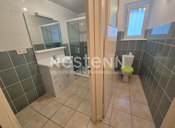 Maison familiale de 174 m² avec partie louée, située dans le bourg de Sulniac