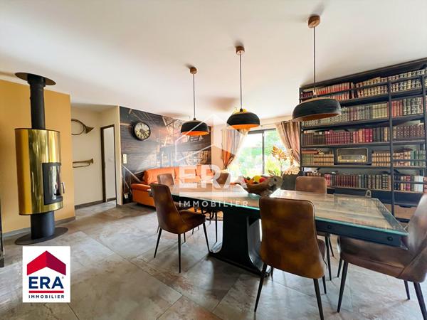 Maison contemporaine de plain-pied avec jardin et garage