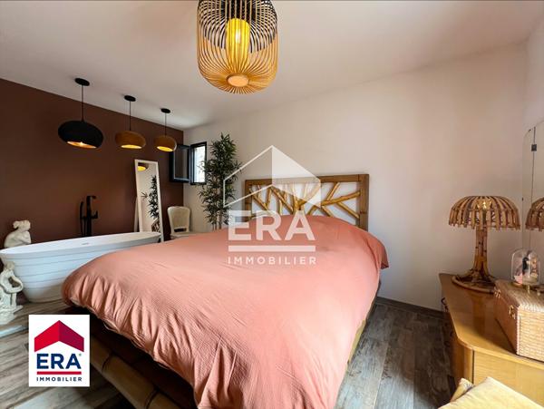 Maison contemporaine de plain-pied avec jardin et garage