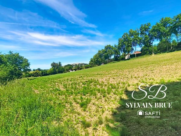 Terrain à bâtir, divisible avec ruisseau à Lauzerte