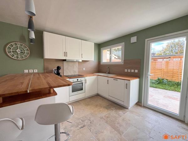 Maison de ville, 4 chambres, jardin et garage!