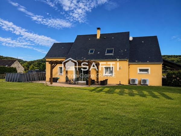 Belle maison familiale avec un grand terrain et prestation de confort dans un environnement privilégié