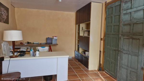 Maison avec dépendances sur terrain de 3,2 ha