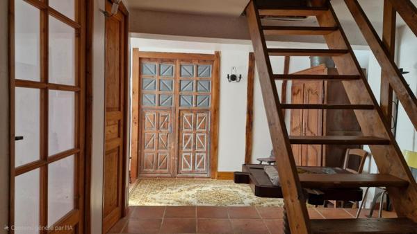 Maison avec dépendances sur terrain de 3,2 ha