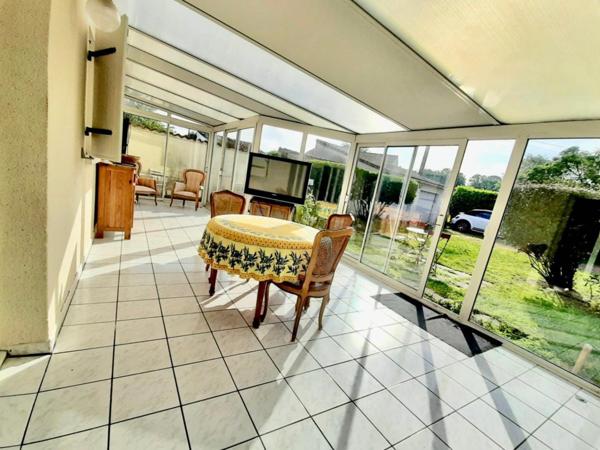 Maison familiale avec véranda,  jardin et garage