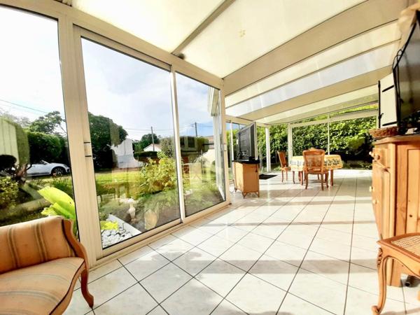 Maison familiale avec véranda,  jardin et garage