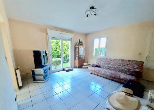 Maison familiale avec véranda,  jardin et garage