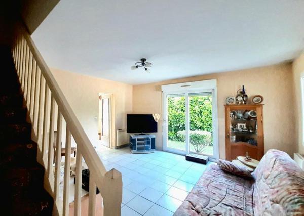 Maison familiale avec véranda,  jardin et garage