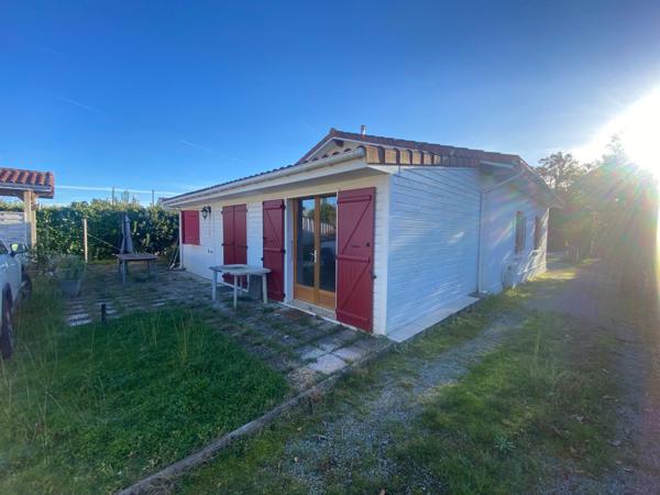 LANTON / BELLE PARCELLE 834m2 / DEUX GRANDS GARAGES / MAISON A RENOVER  100m2 env