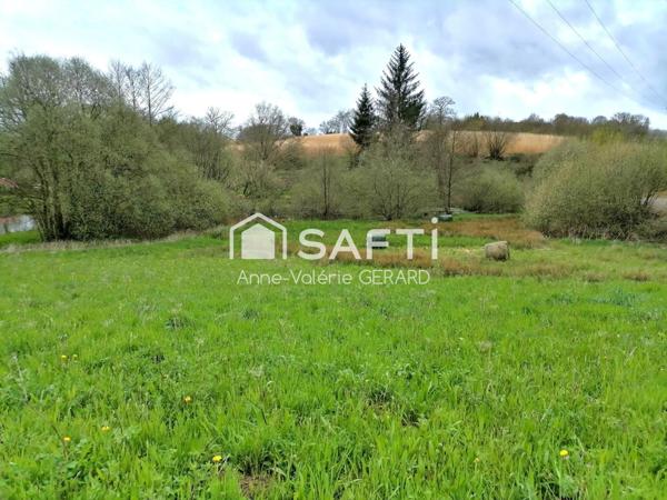 Terrain 3820m² avec garage et mare, accès sécurisé