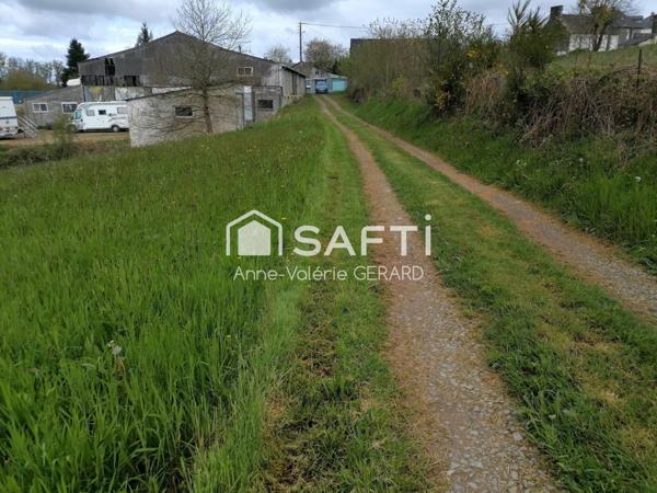 Terrain 3820m² avec garage et mare, accès sécurisé