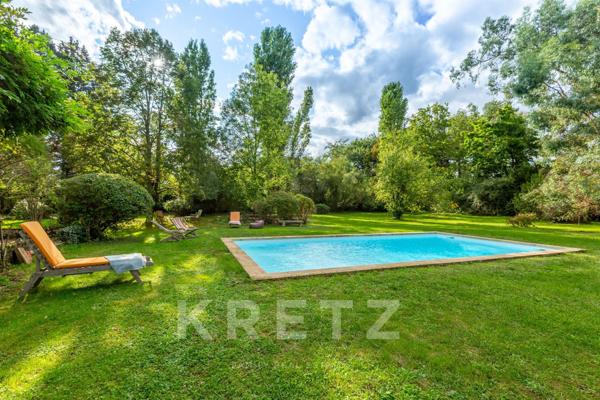 Maison de charme au cœur d’un parc arboré
