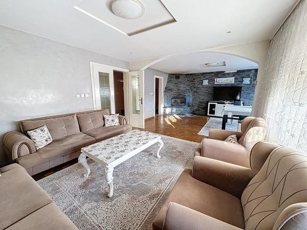 MAISON BI-FAMILLE AVEC JARDIN