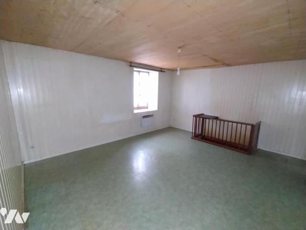 Immeuble mitoyen avec garages d'environ 250 m²