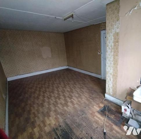 Immeuble mitoyen avec garages d'environ 250 m²