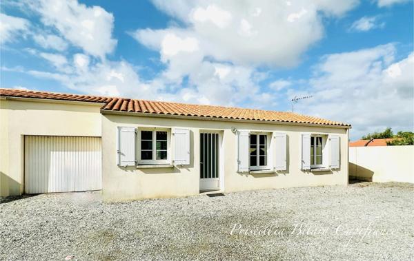 Le Thou. Maison avec garage et jardin.