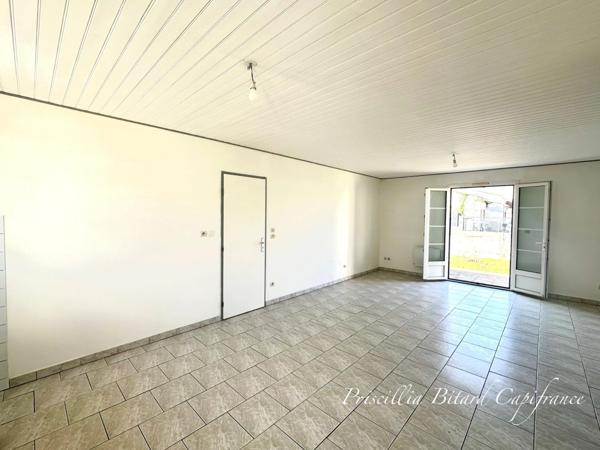 Le Thou. Maison avec garage et jardin.