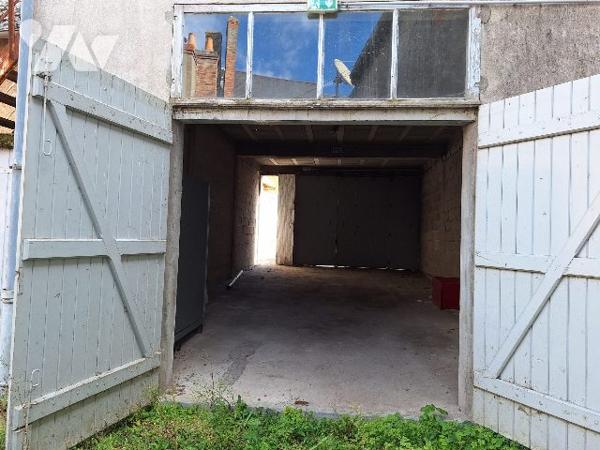 Immeuble commerciale avec garage au coeur d'Aubigny