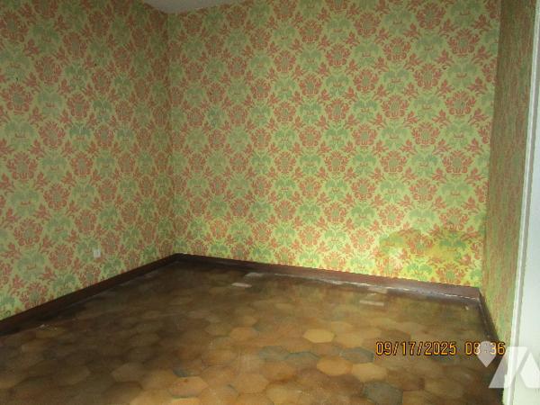Grande propriété composée d'une maison de Maître de 16 pièces  avec dépendances  et terrain de 11 a