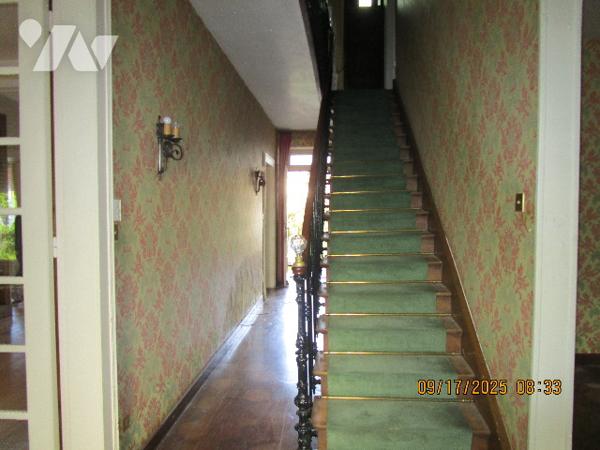 Grande propriété composée d'une maison de Maître de 16 pièces  avec dépendances  et terrain de 11 a