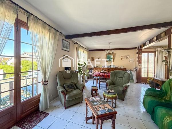 Maison familiale avec espace indépendant et jardin