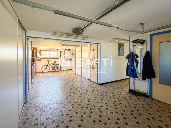 Maison familiale avec espace indépendant et jardin