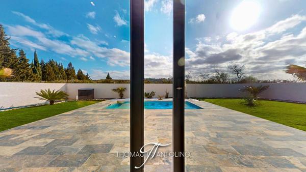 EN EXCLUSIVITE - PLAIN PIED - 4 CHAMBRES - PISCINE - GARAGE