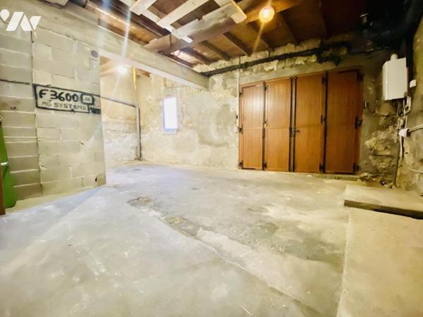 Maison de ville T4 - centre village - 114m² habitables avec cour et garage 