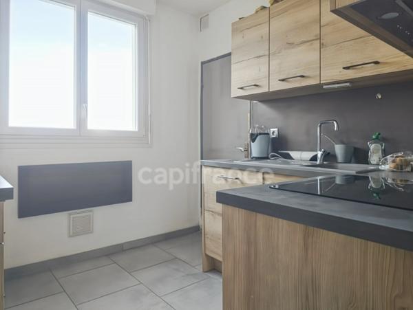 Appartement T4 de 72,10 m² avec cave - Avenue Felix Geneslay