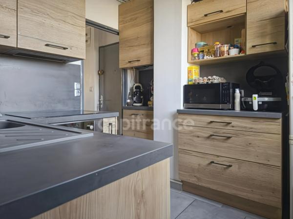 Appartement T4 de 72,10 m² avec cave - Avenue Felix Geneslay