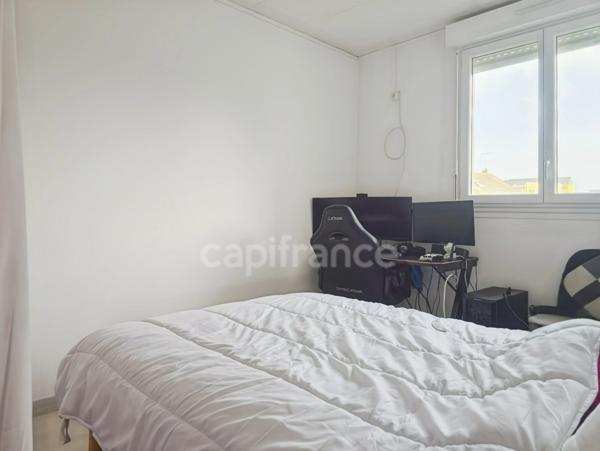 Appartement T4 de 72,10 m² avec cave - Avenue Felix Geneslay